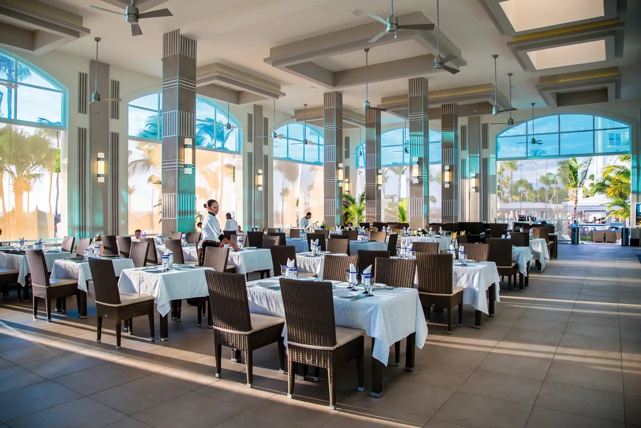 Elegant steakhouse at Hotel Riu Palace Antillas with tropical views and modern decor
